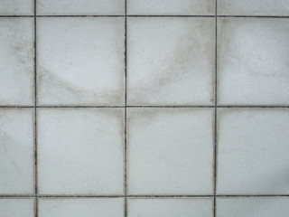 Old tiled white wall texture