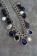 necklace with blue stones isolated on white