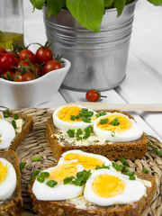 Healthy whole wheat sandwiches with eggs and chives
