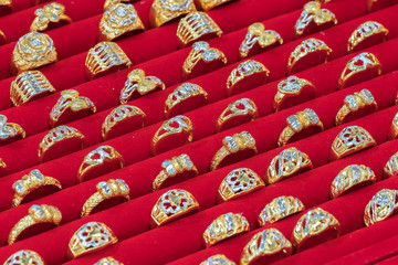 Many ring in a red ring tray.
