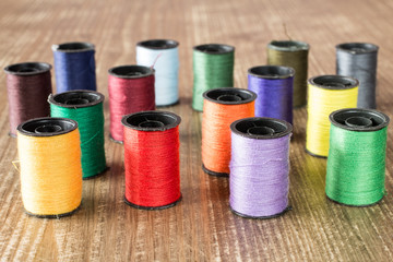 Bobbins with colorful threads