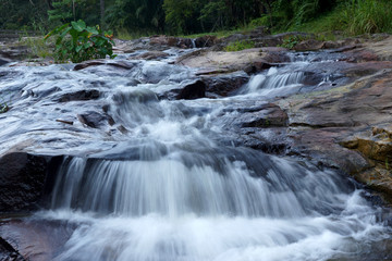 Fototapeta na wymiar Waterfall in tropical forest.
