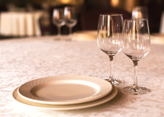 Partly decorated table in restaurant. Close up.