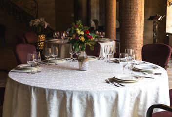 Decorated table, vases of flowers. Close up. Wedding concept