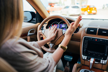 Girl hand drive car and signal