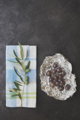 Olives in silver foil