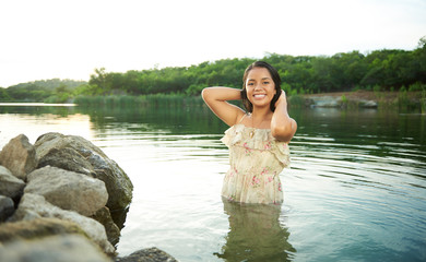 girl posing standing in water