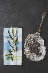 Olives in silver foil