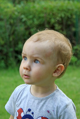 Baby girl looking surprised