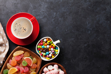 Coffee, colorful candies, jelly and marmalade