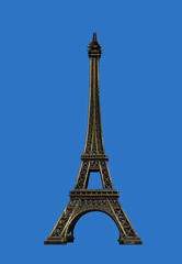 Fototapeta na wymiar Torre Eiffel aislada sobre fondo azul, souvenirs, París, Francia