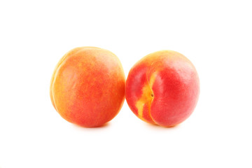 Ripe apricots fruit isolated on a white
