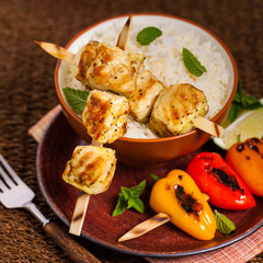 Chicken Kebab or Kabob Skewers with Rice. Selective focus. 