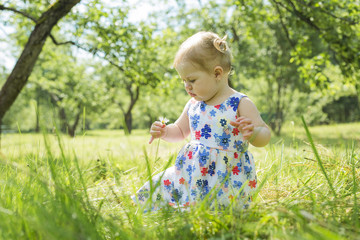 Little girl in the forest park