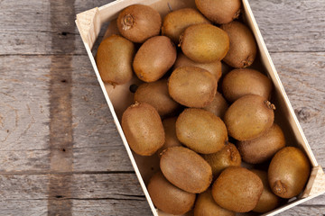 Kiwi in Box. Selective focus.