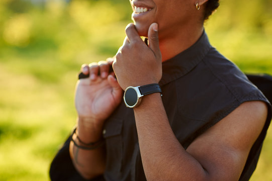 Young man wearing a Smart Watch outdoors
