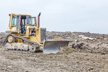 Obraz premium Heavy earthmover construction machine in action