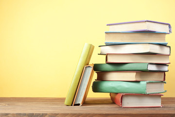 Stack of colorful books. Education background. Back to school. Copy space for text.