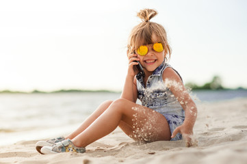 little girl talking on the phone