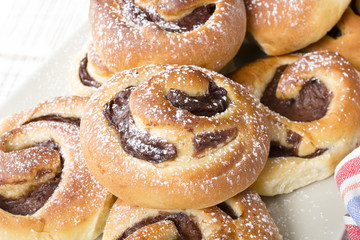 Homemade cream buns with chocolate