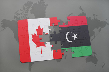 puzzle with the national flag of canada and libya on a world map background.