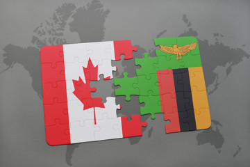 puzzle with the national flag of canada and zambia on a world map background.