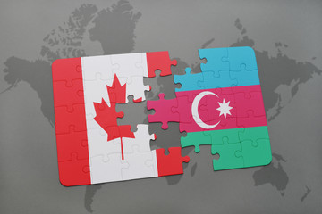 puzzle with the national flag of canada and azerbaijan on a world map background.