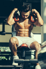 muscular man training in gym