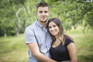 Obraz premium Happy loving young couple at the park