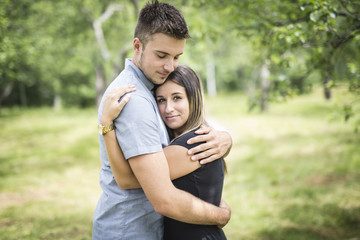Fototapeta premium Happy loving young couple at the park