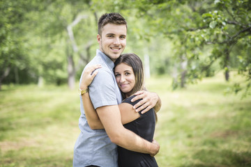 Obraz premium Happy loving young couple at the park