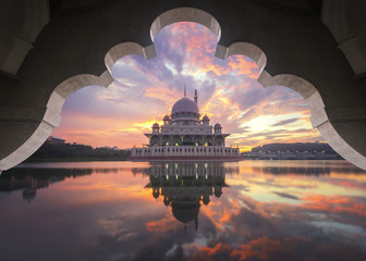 Putra Mosque during sunrise in framing. The Mosque is the principal mosque of Putrajaya, Landmark...