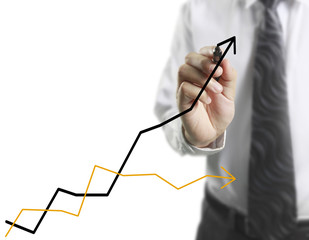 Businessman drawing graphics  growing graph