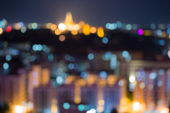 Abstract lights, blurred background with bokeh of city lights.