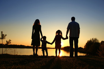 silhouette of a happy family