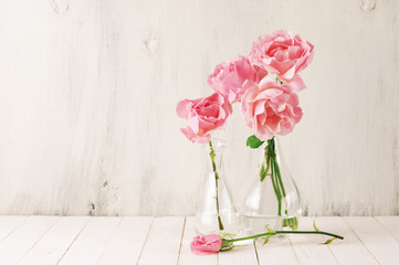 Pink roses in vases