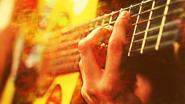 cool gypsy style woman plays guitar