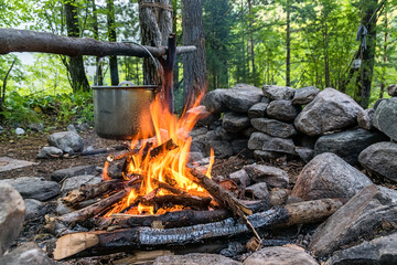 cooking over a fire in field conditions