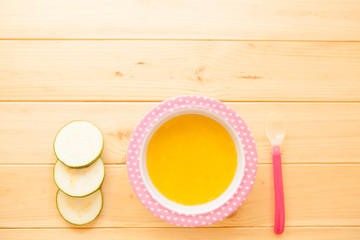 Healthy natural eco baby lure. Soup of squash, carrot, onion, ca
