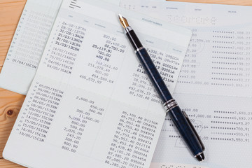 Saving account from bank with pen for financial and loan