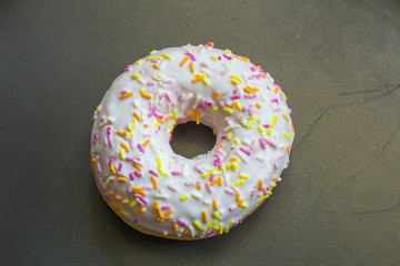 Donut. Sweet icing sugar food. Dessert colorful snack.