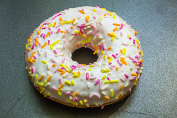 Donut. Sweet icing sugar food. Dessert colorful snack.