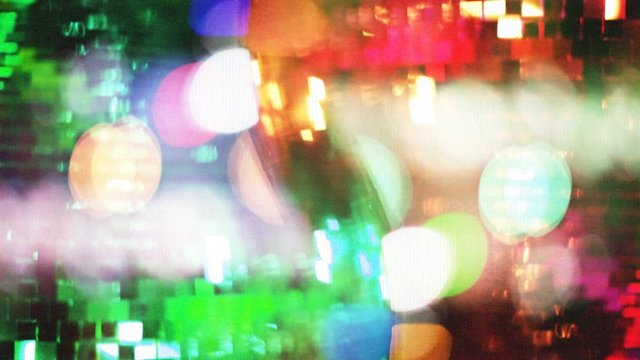 glitterball turning on the nightclub dancefloor