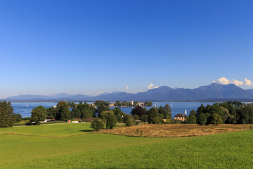Fraueninsel at Lake Chiemsee with Alpes at Gstadt, Bavaria