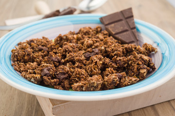 approach take of dish with cereals and chocolate chips