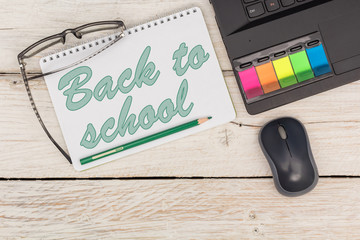 Stationery and text in Notepad: Back to school