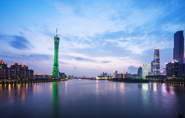 Fototapeta na wymiar Reflection Of Canton Tower And Buildings On River