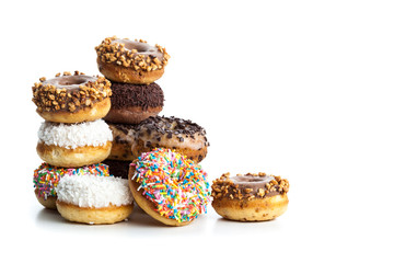 various donuts on white background