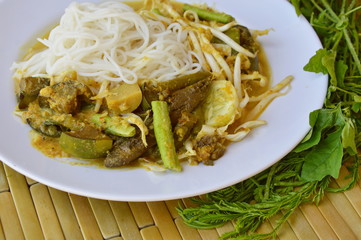 rice noodle with fish curry sauce and fresh vegetable