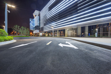 city empty traffic road with cityscape in background